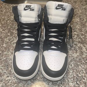 Black and white Jordan 1s